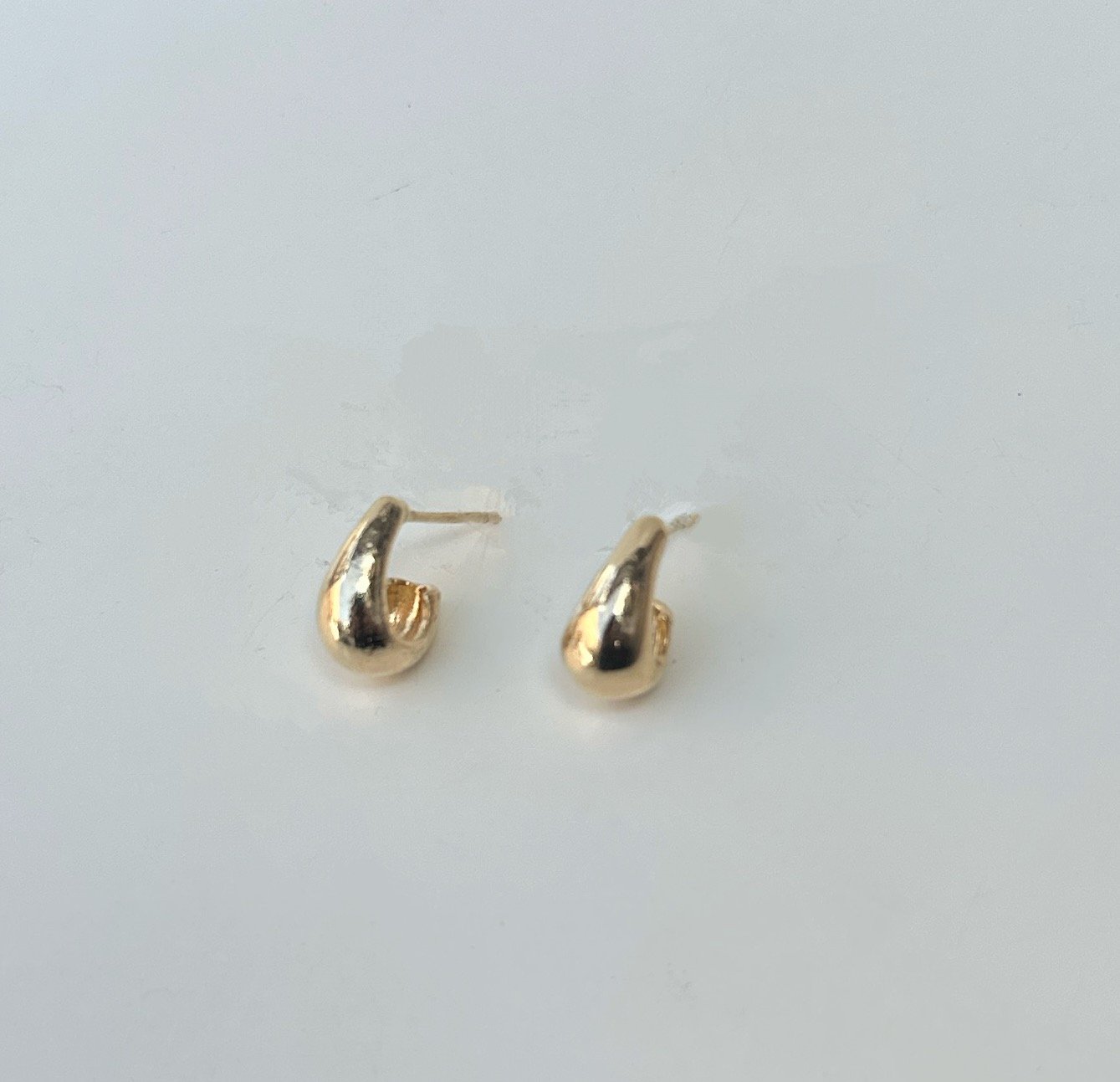 BRINCO GOTA ESCULTURAL